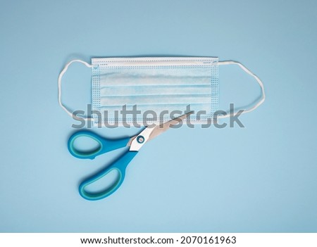 Safety mask against virus. End of pandemic concept, no more corona. Royalty-Free Stock Photo #2070161963