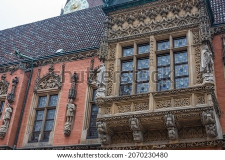 Detail with a beautiful balcony on historical city hall in Wroclaw, Poland Royalty-Free Stock Photo #2070230480