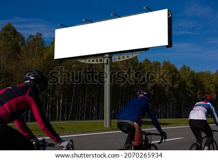 Large white billboards for outdoor advertising along the roads
