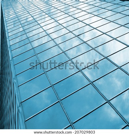 reflecting modern skyscraper glass