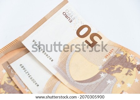 Several of 50 Euro banknotes, finance currency isolated on dark background. banknotes 100 and 50 euros. Several hundred euro banknotes. euro money cash, Concept of wealth, saving or spending money. 