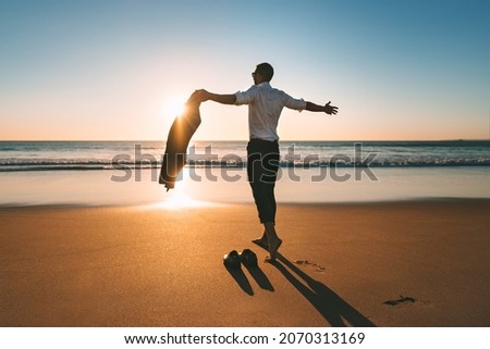 Life is good. Successful man enjoying life and freedom. Work life balance. Day off work concept. Free man with open arms enjoying nature. Royalty-Free Stock Photo #2070313169