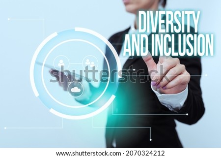 Hand writing sign Diversity And Inclusion. Word Written on range human difference includes race ethnicity gender Woman In Suit Holding Tablet Showing Futuristic Interface Display.