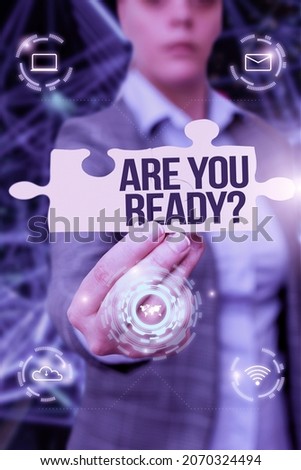 Conceptual caption Are You Ready Question. Conceptual photo used telling someone start something when feel prepared Business Woman Holding Jigsaw Puzzle Piece Unlocking New Futuristic Tech.