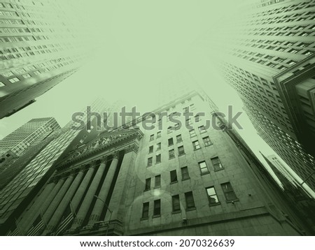 Historic buildings of Wall Street in New York City with green color effect