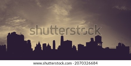 Buildings and skyscrapers of the downtown Manhattan skyline in New York City with vintage faded color effect