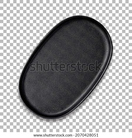 Empty oval roasting or baking pan, isolated on transparency. Royalty-Free Stock Photo #2070428051