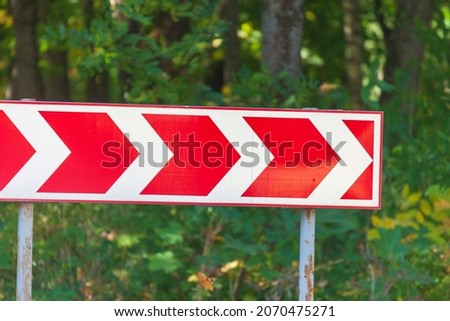 Red and white stripes of a road sign prohibiting the passage of vehicles