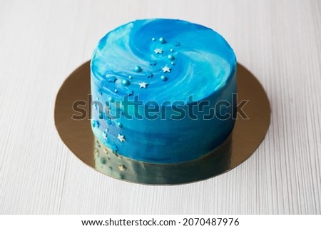 Blue cake with stars. Cake space