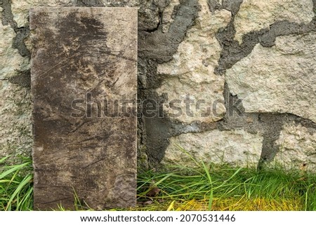 masonry of stones with cement. advertising picture. the frame for the inscription. stone fence. textured object.