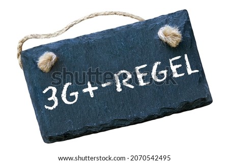 German Corona 3G+ Rule and sign isolated against white background closeup Royalty-Free Stock Photo #2070542495