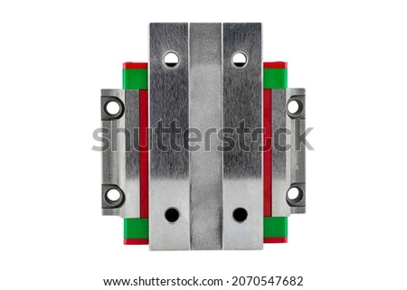 Macro photo of a old linear bearing with a linear trolley, isolated on a white background.