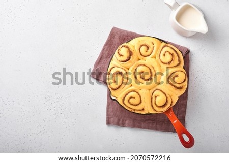 Cinnamon rolls or cinnabon homemade recipe raw dough preparation sweet traditional dessert buns pastry food baked homemade swirl Danish mini snack. Food ingridients. Top view. Fall baking concept