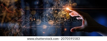 Woman hand touching The metaverse universe,Digital transformation conceptual for next generation technology era. Royalty-Free Stock Photo #2070595583