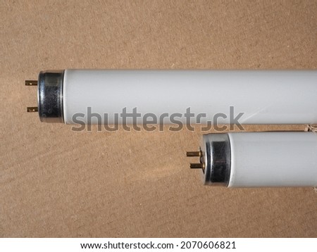 fluorescent neon tubes low pressure mercury vapor gas discharge lamps Royalty-Free Stock Photo #2070606821