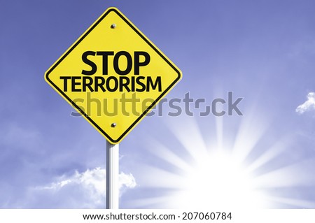 Stop Terrorism road sign with sun background 