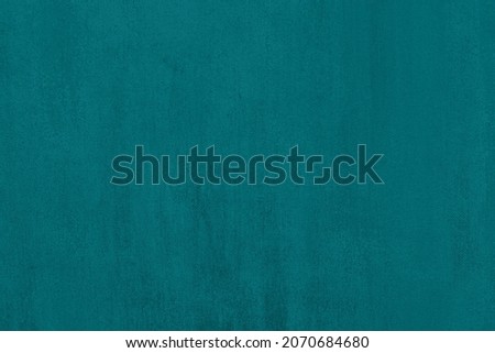 Teal green solid colored abstract painted canvas texture. Vintage grunge background elegant design. Year color concept Royalty-Free Stock Photo #2070684680