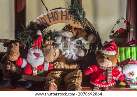 Christmas concept with various Christmas plush toys including Santa Claus , teddy bears and snowman , selective focus