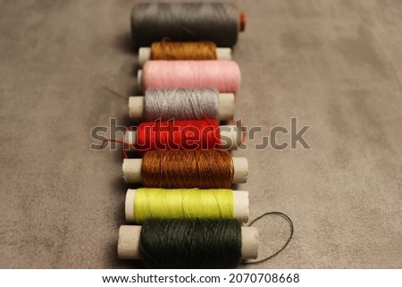 Beautiful knitting at home background with needles and yarn