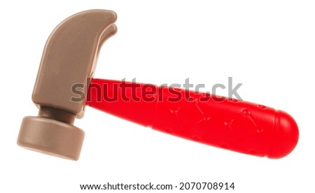 Plastic toy hammer isolated on white background. Cartoon concept toy for kids