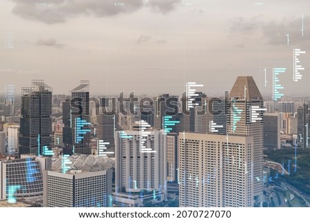 Market behavior graph hologram, sunset panoramic city view of Singapore, popular location to achieve financial degree in Southeast Asia. The concept of financial data analysis. Double exposure.