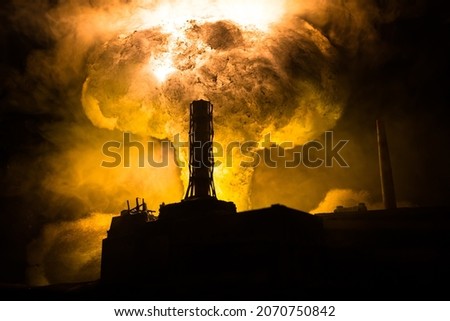 Creative artwork decoration. Chernobyl nuclear power plant at night. Layout of abandoned Chernobyl station after nuclear reactor explosion. Selective focus Royalty-Free Stock Photo #2070750842