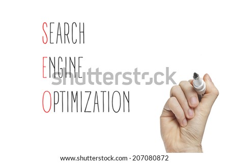 Hand writing search engine optimization on a white board