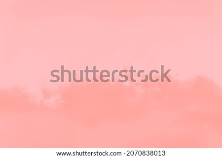 Abstract coral soft color sky background with clouds, copy space