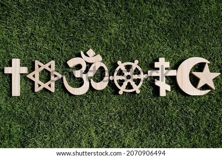 Religious symbols. Christianity, Islam, Judaism, Orthodoxy Buddhism and Hinduism. Interreligious or interfaith concept.
 Royalty-Free Stock Photo #2070906494