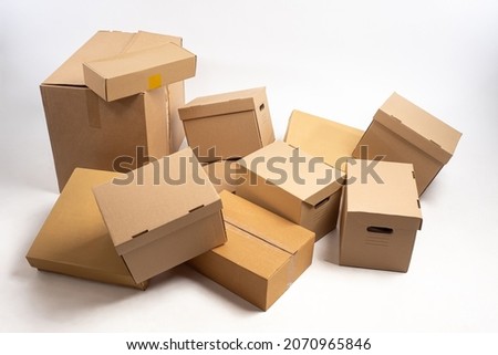 Several cardboard boxes. Boxes of different sizes. Set of boxes represent packaging materials. Concept for sale of packaging materials. Chests for packing and transportation. Cardboxes set Royalty-Free Stock Photo #2070965846