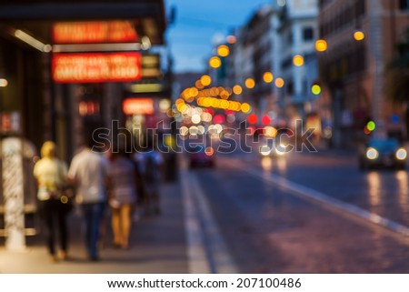 intentional out of focus picture of a city scene at night with traffic lights 