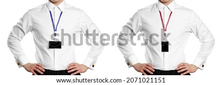 A man in a white and black shirt with a badge. Front. Close up. Isolated on white background.