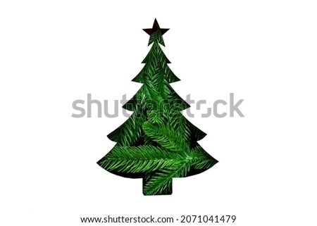 Green Christmas tree shape cut out white paper Creative concept Holiday Xmas card Happy New Year celebration