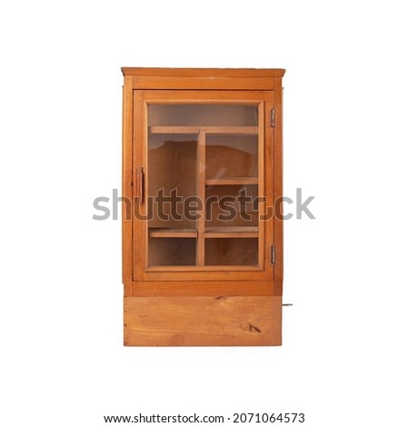 Old wooden medicine cabinet on white background Royalty-Free Stock Photo #2071064573