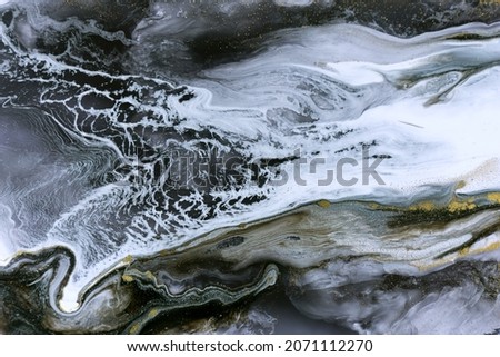 Marble gray abstract acrylic background with gold dust.