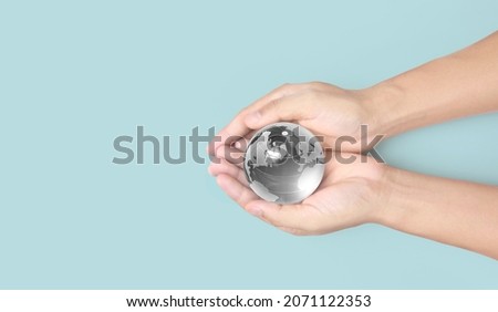 Globe in hand,Energy saving concept, Elements of this image furnished by NASA