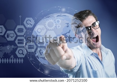 Internet of things concept. Business person selects the abstract on the virtual display.