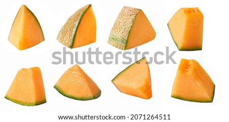 small pieces of cantaloupe melon isolated on white background. Royalty-Free Stock Photo #2071264511