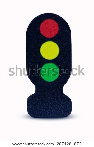 Traffic lights - toy made of wood small isolated on white background. Suitable for children to enhance brain development. Children's toy. 
