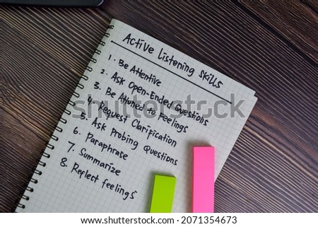 Active Listening Skills write on a book with keyword isolated on Wooden Table. Royalty-Free Stock Photo #2071354673