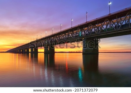 Amur bridge at sunset. Trans siberian railway. Khabarovsk, far East, Russia.  Royalty-Free Stock Photo #2071372079