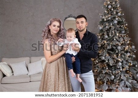 family with little baby boy enjoying their time together at home