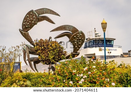 Crab sculpture made of flowers on the pier 39.  Royalty-Free Stock Photo #2071404611
