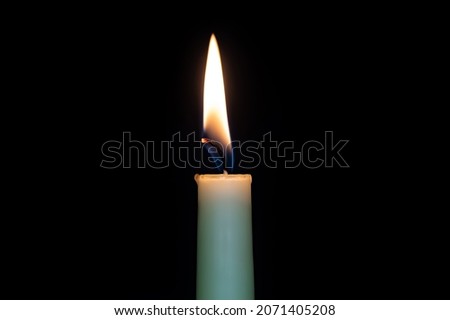 burning stickhandle with stable light on black background