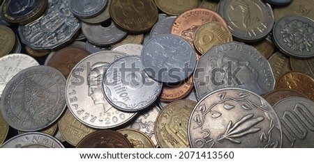 Coin background. Different coins from all over the world. Bank concept. Earning money.