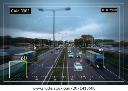 Ai tracking traffic automobile vehicle car recognizing speed limit and information system, security surveillance camera monitoring motorway traffic tracking artificial intelligent technology. Royalty-Free Stock Photo #2071413608