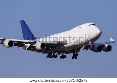 Aerotranscargo Boeing 747-400 cargo airplane landing in Graz, Austria Royalty-Free Stock Photo #2071452575
