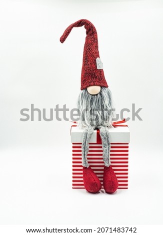 Funny Christmas gnome isolated on white. Festive decor.Scandinavian christmas traditional gnome.