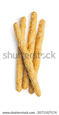 Breadsticks grissini. Bread sticks with sesame seeds isolated on white background. Royalty-Free Stock Photo #2071507574