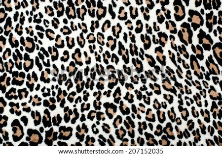  Brown and black leopard pattern. Fur animal print as background.
